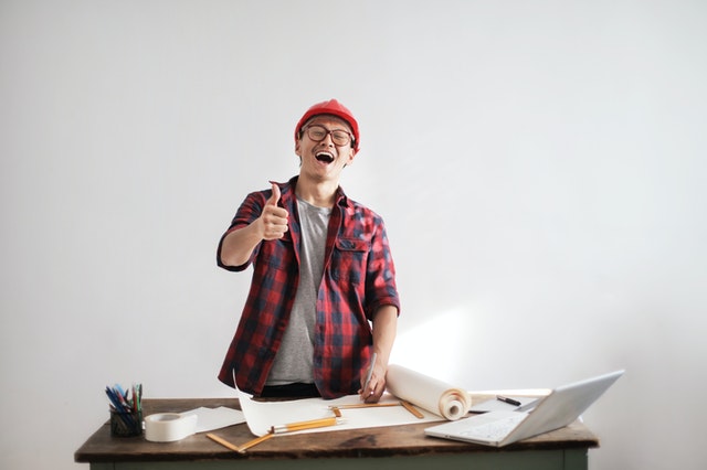 construction worker showing thumb up 