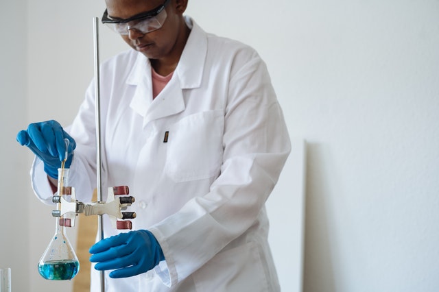 Researcher Conducting Biochemical Experiment